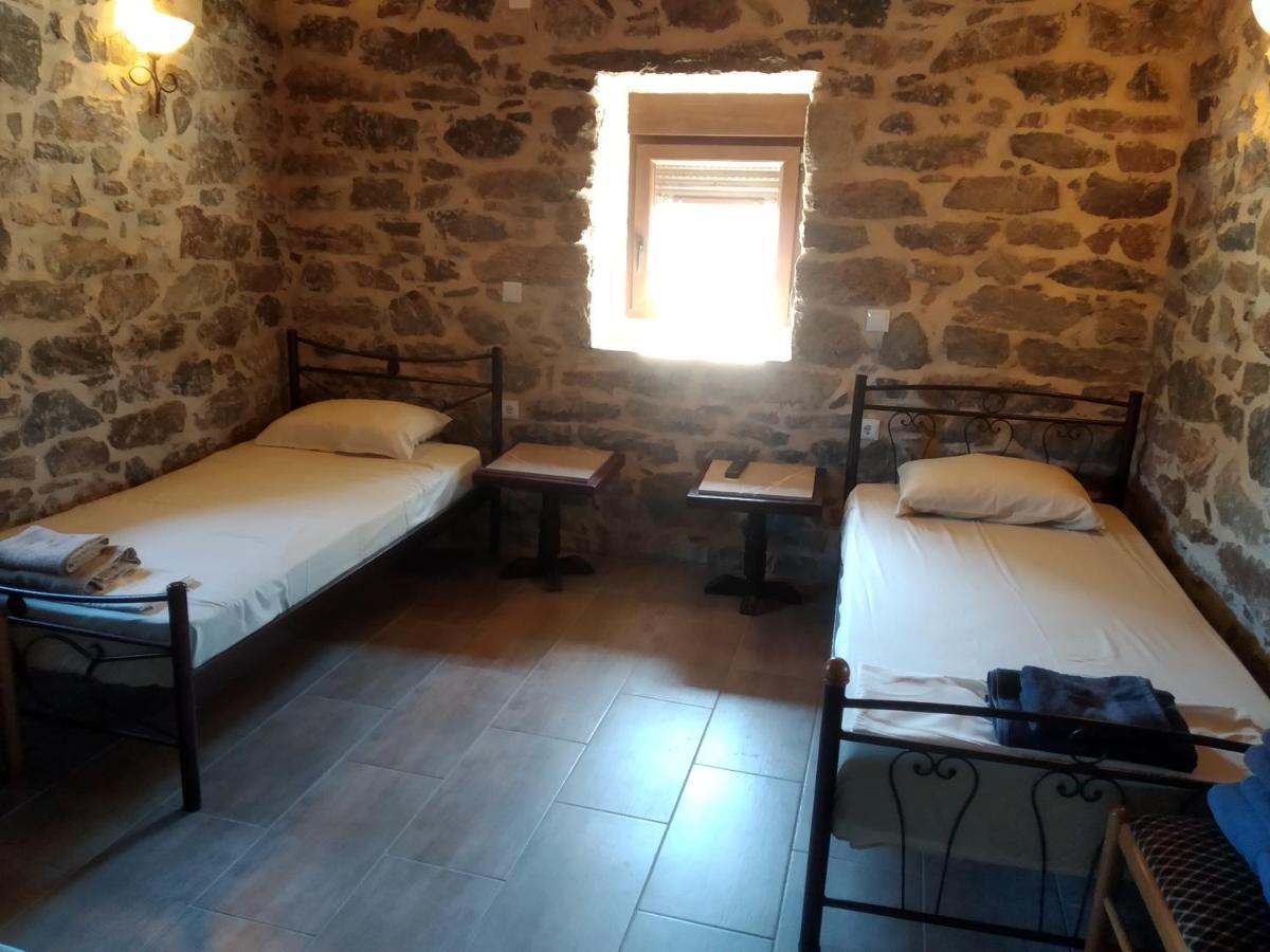 Villa panos stone tower Paliros Esterno foto