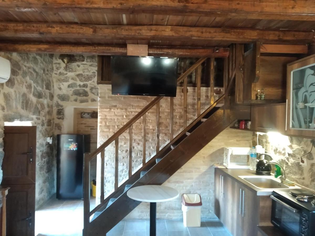 Villa panos stone tower Paliros Esterno foto